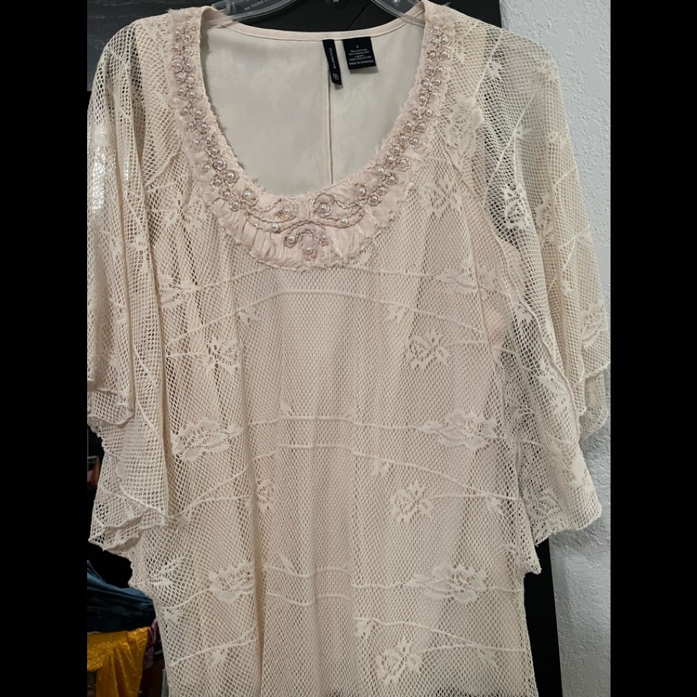 Cream colored lace top.